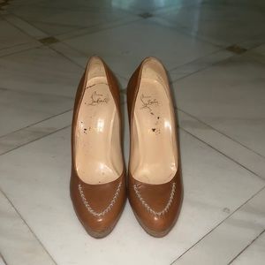 Camel with ivory stitching authentic Christian Louboutin pumps.